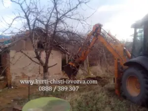 Събаряне на сграда с багер 9